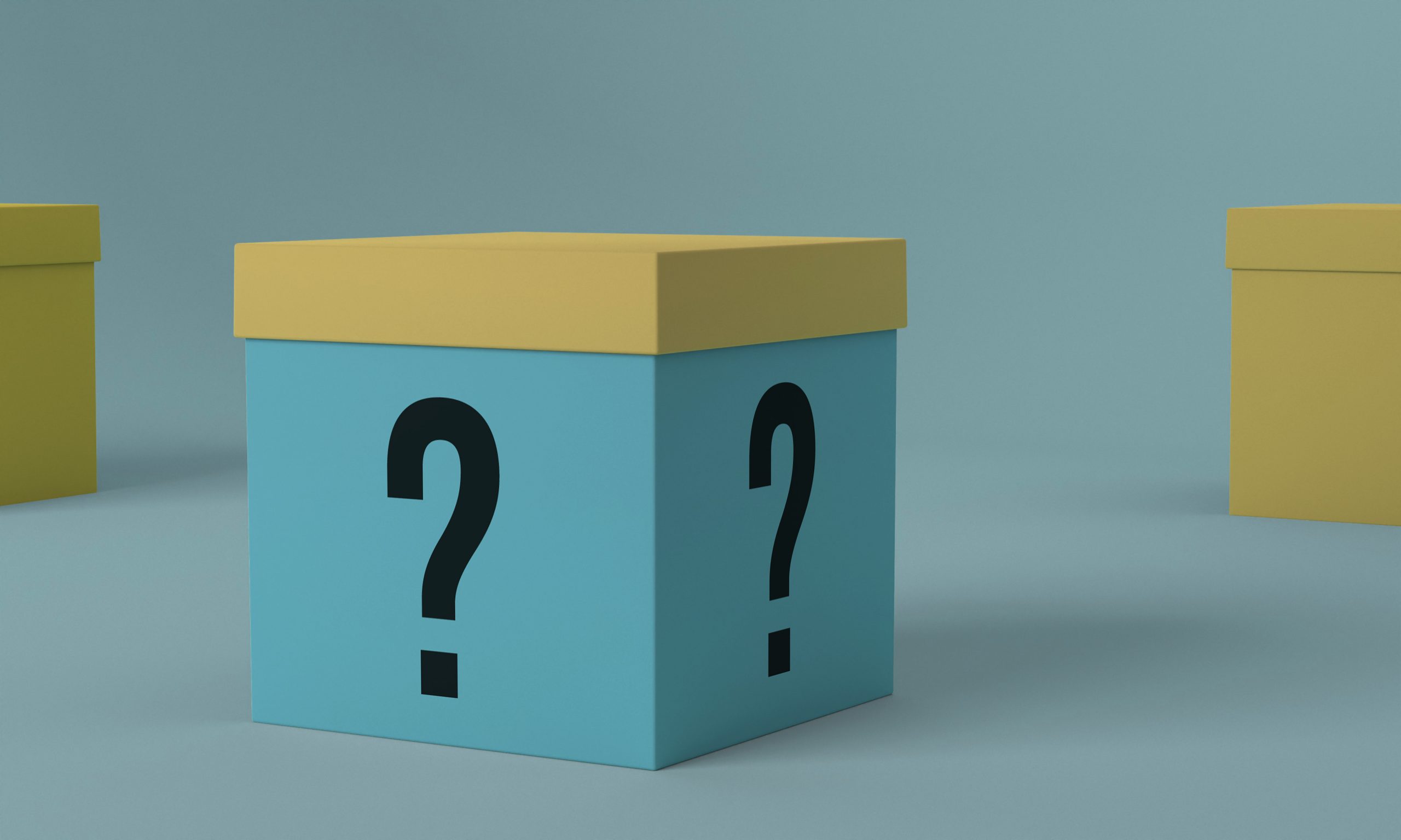 mystery-box-collage cube en bleu et jaune avec des points d'interrogation